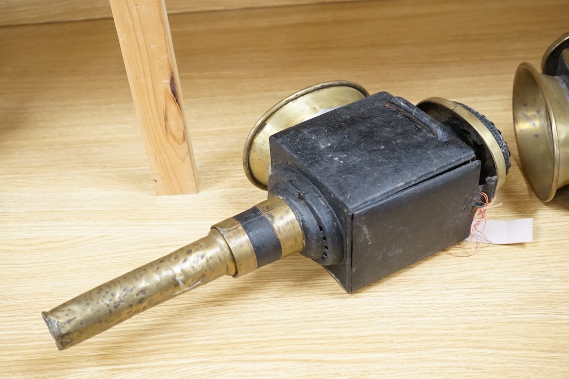 A pair of 19th century brass coaching lamps, 44cm high